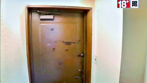 Scratched brown wooden door in white hallway before intense rough sex action