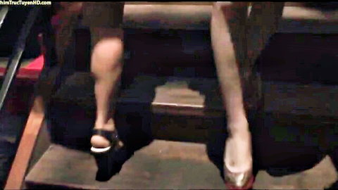 Slim East Asian legs in sexy high heel sandals teasing foot fetish closeup