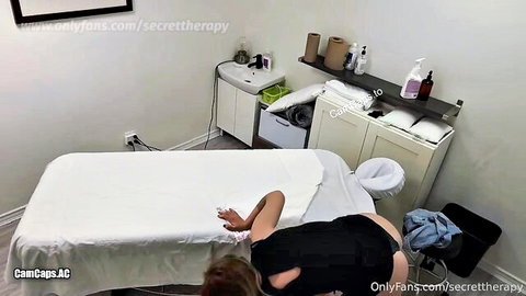 Curvy brunette MILF bent over massage table exposing big bare ass in POV