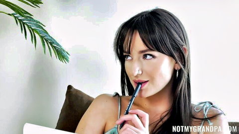 Lana Smalls petite brunette teasing with pen in strappy top