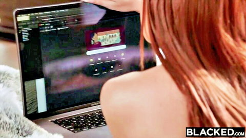Sly Diggler redhead topless viewing laptop in Blacked teaser
