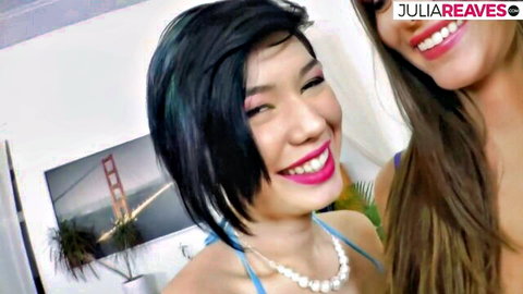 Julia Reeves and busty friend in bikini smiling seductively for deepthroat fun