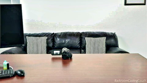 Backroom Casting Couch empty audition room setup with leather couch