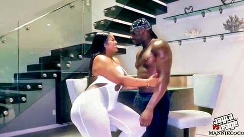 Jayla Page in tight white bodysuit teasing with muscular black partner