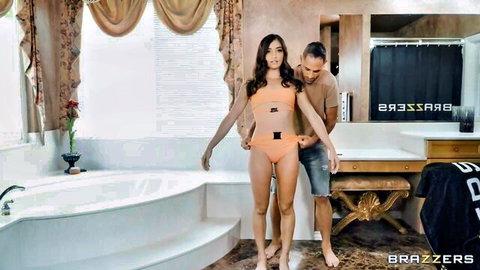Emily Willis in skimpy orange bikini teased by man in steamy scene