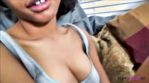 Horny black vixen teasing with deep cleavage in tight tank top
