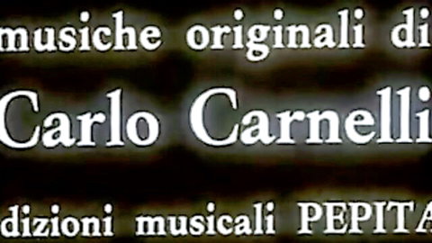 Blurry vintage Italian porn credits screen with Carlo Carnellii music by Pepita editions