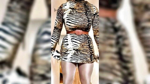 Curvy black tigress in striped bodysuit and gloves solo pose