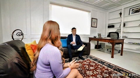 Sexy long-haired brunette in purple dress seduces suited man in office interview