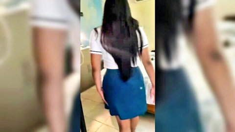 Young schoolgirl in short blue skirt walks away teasing her tight ass from behind