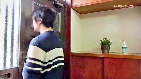 Hana Himesaki in striped sweater, standing at doorway in JAV tease