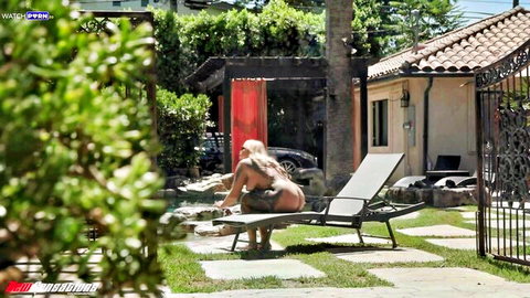 Curvy blonde Stephanie Love nude on pool lounge, big ass view