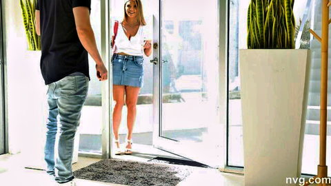 Angie Faith in white blouse and denim mini skirt greeting at door