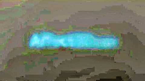 Blurry cyan glowing rectangle on pixelated brown background