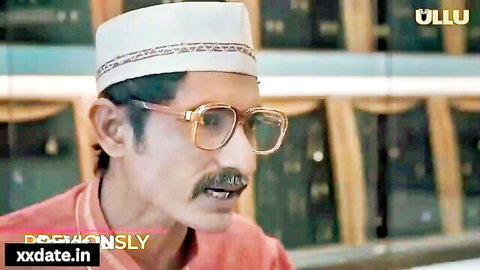 Indian man in glasses and cap from Bhabhi romantic sex video