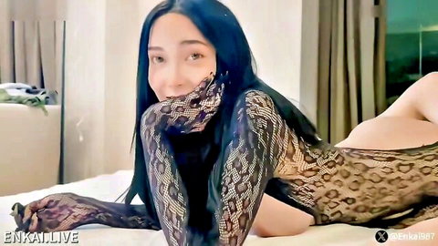 Enkai in seductive leopard print lace lingerie, smiling pose