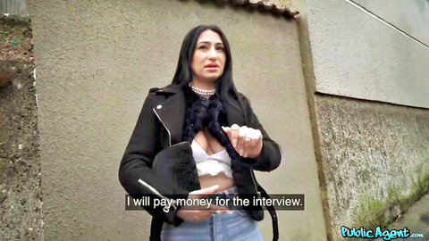 Didi Zerati arab beauty in leather jacket with deep cleavage during cash interview
