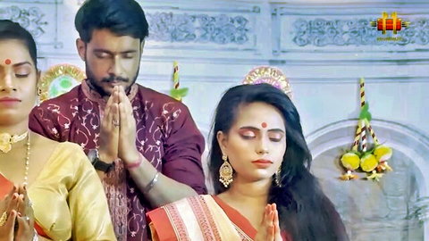 Indian couple and friend in traditional attire pray before hot threesome