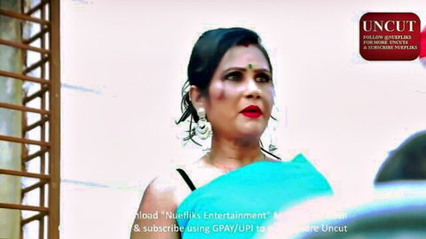 Yami Femjoy as seductive Indian malkin in teal saree, teasing pose
