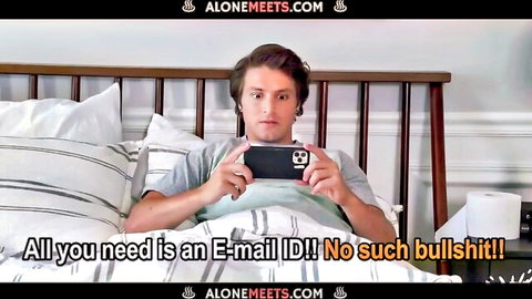 Young man in bed holding phone, Blake Blossom adult video promo thumbnail
