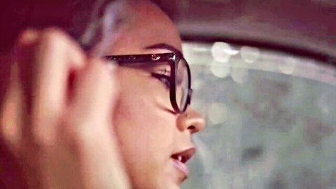 Harley Dean intense gaze in glasses, seductive profile in car