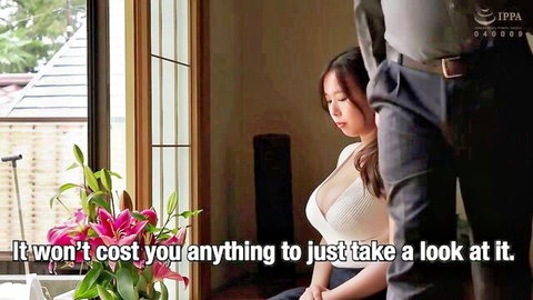 Asian woman in low-cut white lace top looks reluctant as suited man stands behind her in intimate JAV scene