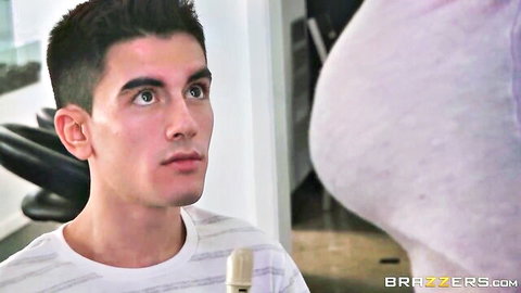Young handsome guy stares surprised at massive pale tits up close