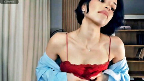 Seductive Asian webcam model in red lace bralette, teasing solo