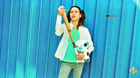 Jenny Stella teases with baseball bat and teddy bear in pigtails