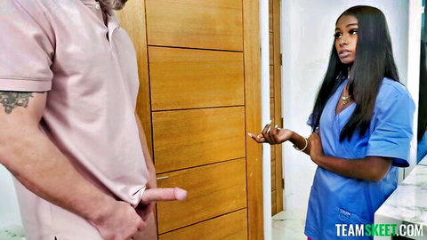 Sexy black nurse with long hair teases exposed cock in uniform