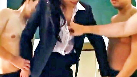 Busty Japanese office lady groped by shirtless muscular men fondling her big tits in classroom