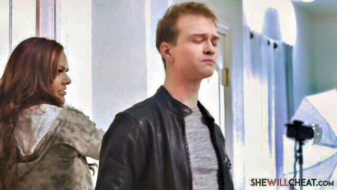 Brunette in hoodie glances back seductively at handsome guy in leather jacket on cheating set