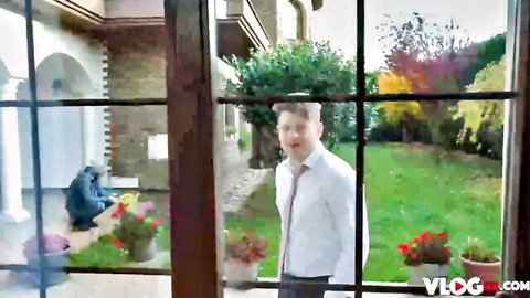 Michael Fly teasing Mina Von D in garden through window, clothed preview