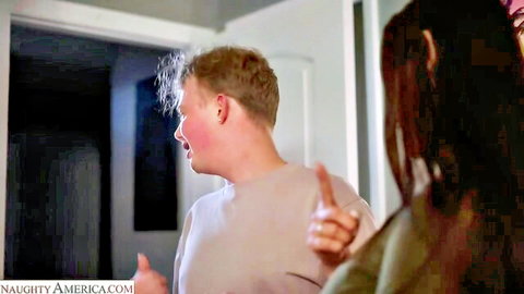 Miss Raquel and man in intimate bedroom scene, Naughty America blowjob preview