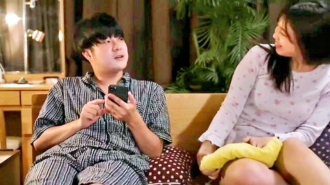 Iori Nanase as stepmother-in-law in pink pajamas, flirting on couch with stepson