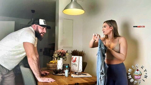 Blonde babe with big tits in skimpy bralette and tight jeans teases bearded guy holding denim pants