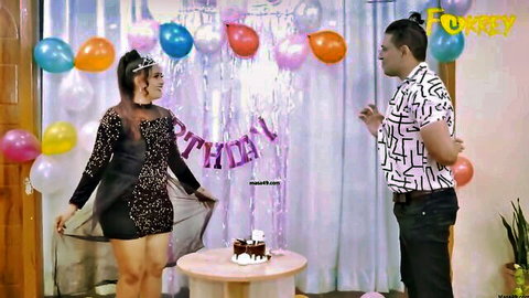 Sexy Indian brunette in sheer sparkly mini dress celebrates birthday with hot man at party