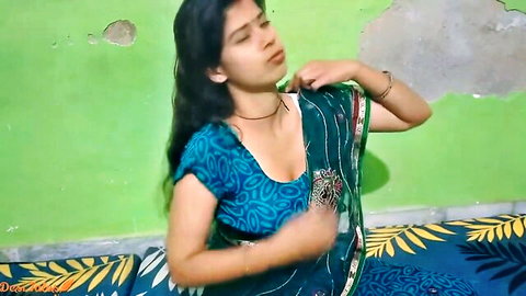 Sexy Indian babe in tight blue saree blouse teasing deep cleavage and big tits