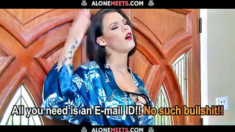 Peta Jensen seductive pose in open blue robe, teasing cleavage
