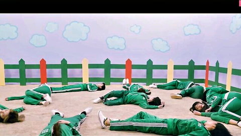 Group of Asian women in green tracksuits lying in circle, Squid Game parody adult scene