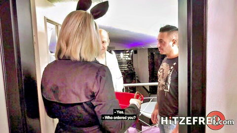 Tatjana Young in bunny ears, naughty dress delivery to two men at door