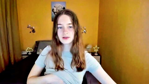 Cute petite teen babe smiling on webcam in tight white t-shirt teasing perky tits