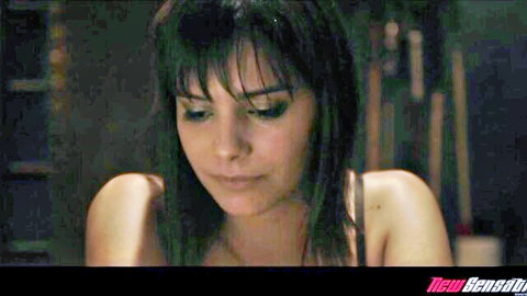 Young brunette with bangs gazes down intently ready for deep throat cock sucking