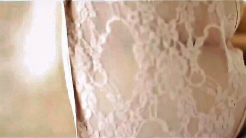 Sexy April in pink lace lingerie, teasing with curves