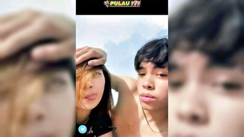 Blurry thumbnail of Dona and Doni touching intimately outdoors