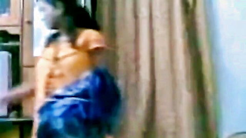 Indian lady in blue sari, topless pose in bedroom, desi amateur style