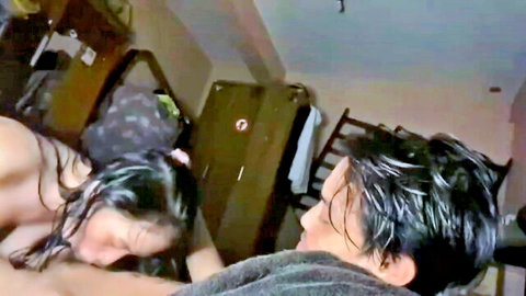 Nude Indonesian girlfriend in intimate spooning with partner