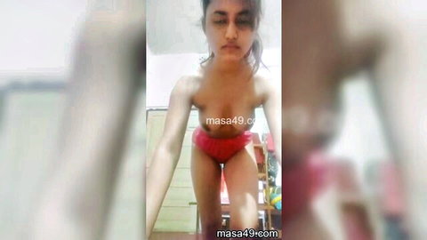 Desi Indian college girl solo stripping, spreading legs and showing pussy closeup