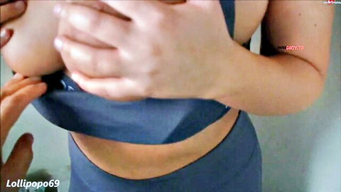 Lollipopo69 teases in blue sports bra and leggings at gym, exposing breasts