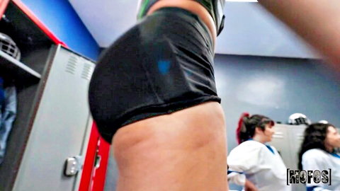 Claire Black's thick ass in tight black shorts, curvy locker room tease
